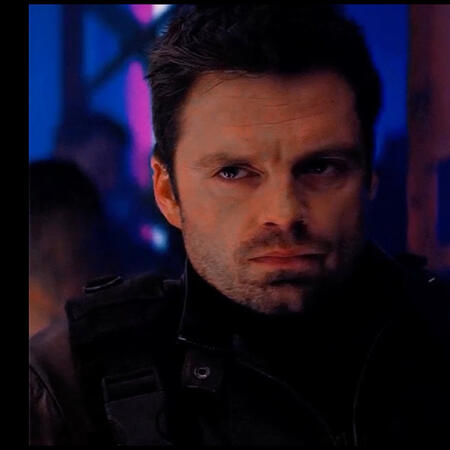 an image of the character bucky barnes from marvel cinematic universe, he has a serious look on his face